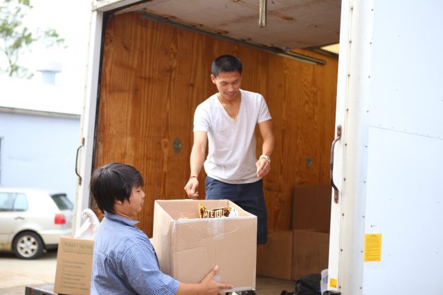 Two volunteers loading truck